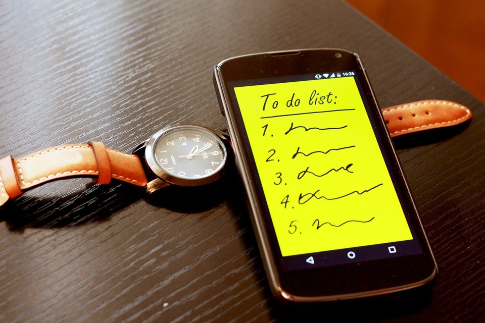 Iphone with watch and to do list